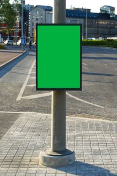 Chroma key Blank billboard and outdoor advertising. Mockup poster outside. Trash in the city on a lamppost, a place for advertising