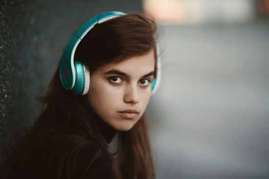 Web radios music concept. Young pretty girl with headphones.