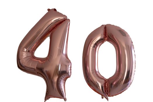 Pink gold Helium Balloon in the shape of the number 40 isolated on white. Suitable for forty years celebration or anniversary , 40 billboard or 40 percent discount.