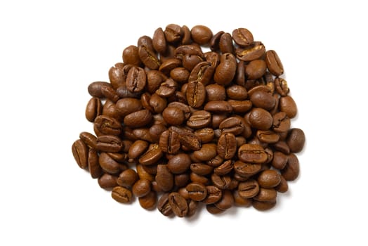 Pile of roasted coffee beans isolated in white background