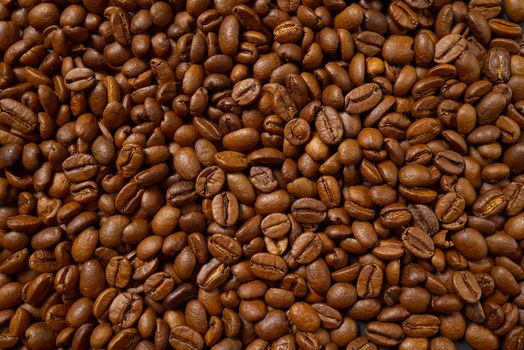 Texture of coffee beans. Roasted coffee beans background. close up Coffee beans.