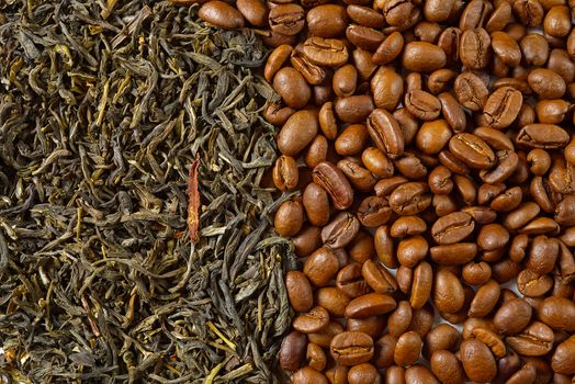 Dry leaves of green tea and fine Roasted coffee beans, top view closeup. Coffee or Green tea concept