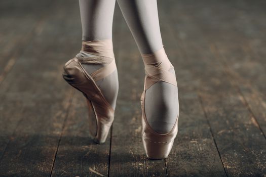 Ballerina legs in pointe close up.