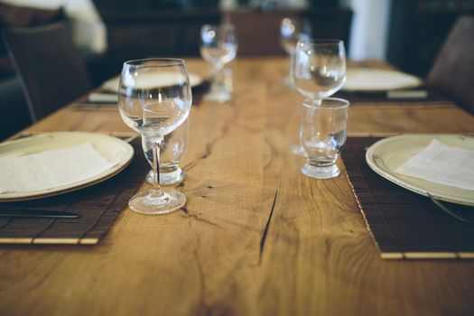 Wooden table with dining set.