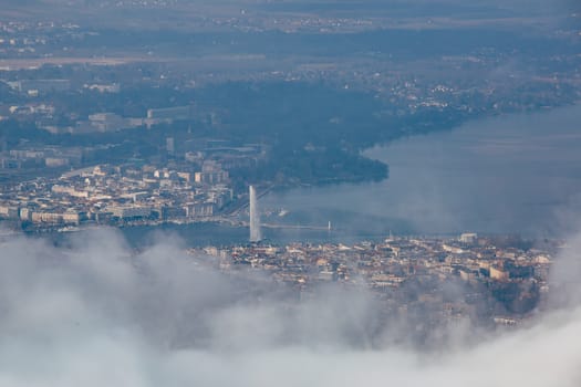 Aeria view of the city of Geneva on a foggy winter day.
