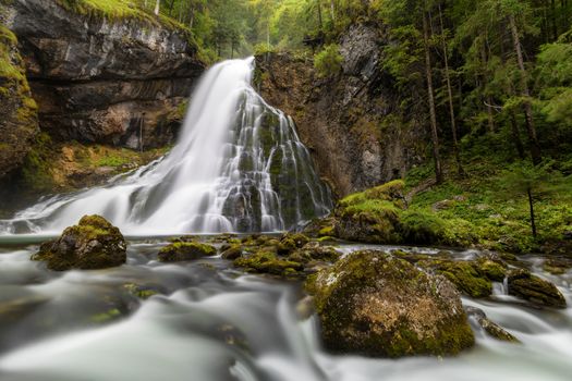 Beautiful Golling waterfall and near Golling and Salzach medieval town at autumn in Austria