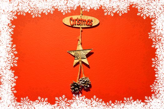 Christmas decoration on red background with snowflakes as frame