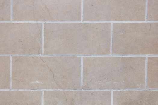 Wall pattern with bricks and cement, background texture