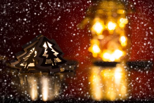 Christmas tree lights covered with snow flakes