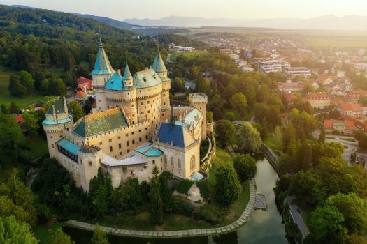 Aerial view of Bojnice medieval castle, UNESCO heritage in Slovakia. Romantic castle with gothic and Renaissance elements built in 12th century.