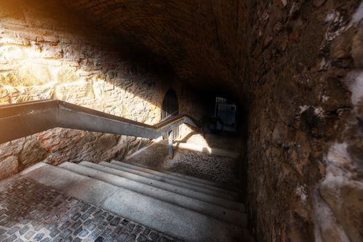 Narrow street in Bratislava city center, low light athmosphere