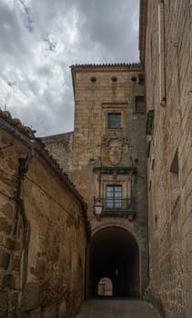 Street view of the historic medieval town of Caceres, Spain. The Old town of Caceres is declared a UNESCO World Heritage site ref 384b