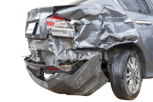 In raining day back side of  gray color car damaged and broken by accident on road parking can not dirve any more. isolate on white background. Save with cliping path
