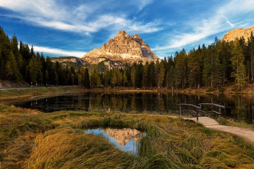 Antorno lake with famous Tre Cime di Lavaredo (Drei Zinnen) mount. Dolomite Alps, Province of Belluno, Italy, Europe. Beauty of nature concept background.