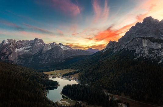 Putna Sorapis mountains at evening, aerial view with Misurina lake.