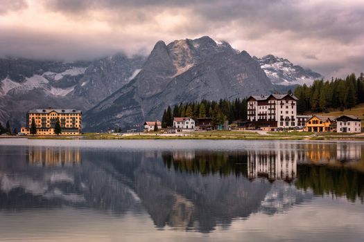 View of Punta Sorapis mountain of the Dolomites in the morning with the reflection on the famous lake Misurina at Cortina d'Ampezzo in Italy