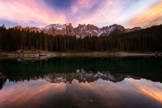 Beautiful sunset at Carezza lake, Dolomites, Italy, Europe