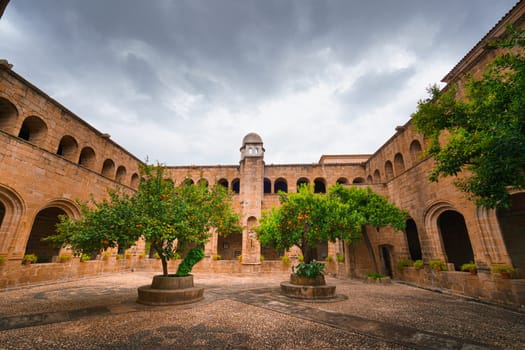 Wide view of a Medieval Cloister in Extremadura, Spain.