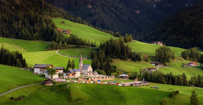 Famous best alpine place of the world, Santa Maddalena (St Magdalena) village with magical Dolomites mountains in background, Val di Funes valley, Trentino Alto Adige region, Italy, Europe