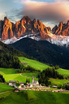 Famous best alpine place of the world, Santa Maddalena (St Magdalena) village with magical Dolomites mountains in background, Val di Funes valley, Trentino Alto Adige region, Italy, Europe