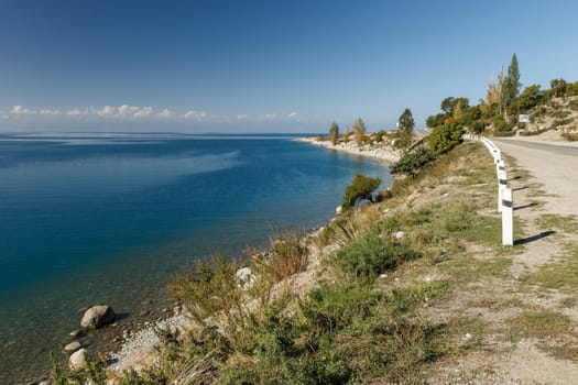 Issyk-Kul Lake in Kyrgyzstan. highway on the south shore of the lake.