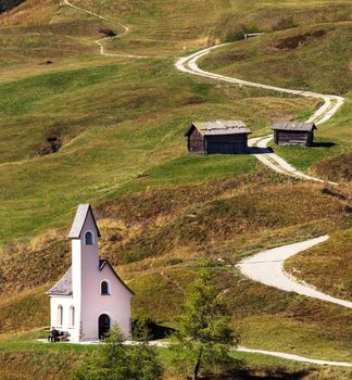 Nature landscape with nice church in a mountain pass in Italy Alps.