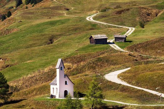 Nature landscape with nice church in a mountain pass in Italy Alps.