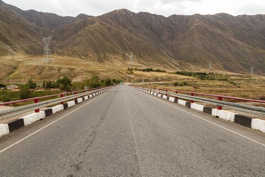 bridge over the Naryn river near the Toktogul reservoir on the Bishkek Osh highway in Kyrgyzstan.