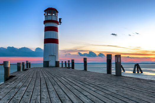 Lighthouse during winter sunset, Podersdorf am see, Austria