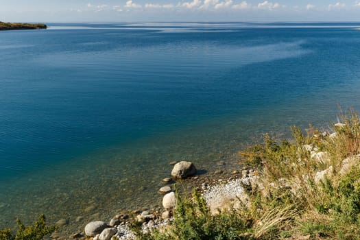Issyk-Kul Lake in Kyrgyzstan, clear water on the southern shore of the lake