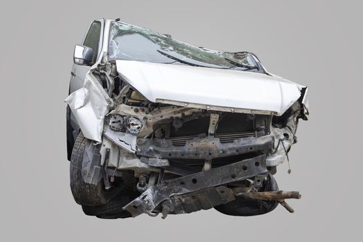 White color car damaged and broken by accident . Isolate on gray background. Save with cliping path