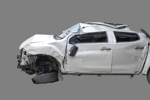 White color car damaged and broken by accident . Isolate on gray background. Save with cliping path