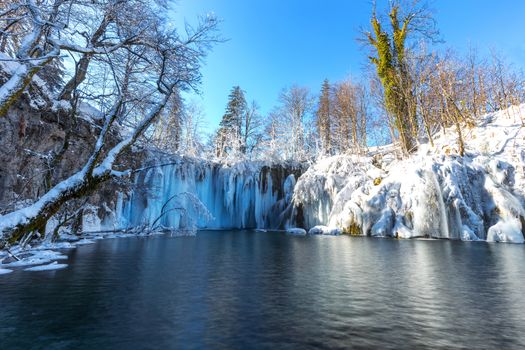 Frozen and beautiful waterfall at plitvice lakes, Croatia