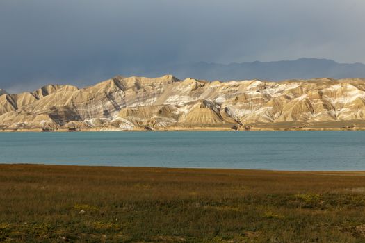 Toktogul Reservoir in the territory of the Toktogul district of the Jalal-Abad region of Kyrgyzstan.