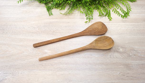 wood spoon wood Turner on white wood background