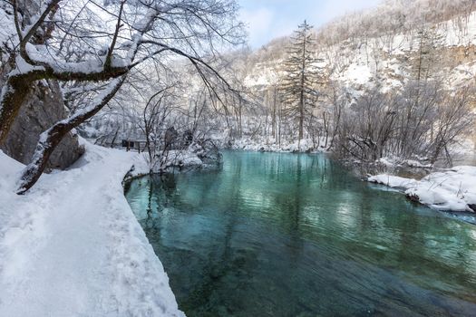 Path thru snow at plitvice lakes during winter, Croatia, Europe