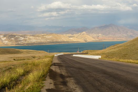 road to Toktogul reservoir, reservoir in the territory of the Toktogul district of the Jalal-Abad region of Kyrgyzstan.