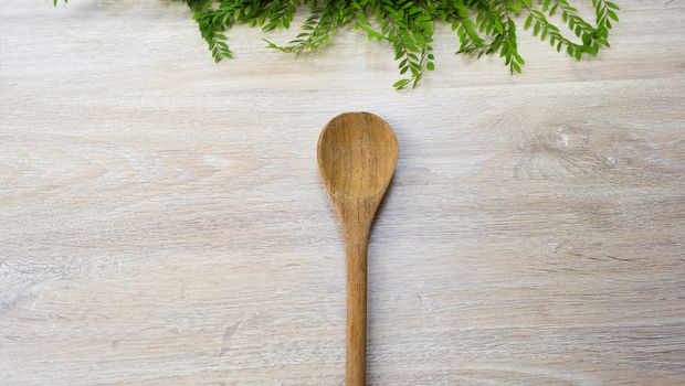 wood spoon wood Turner on white wood background