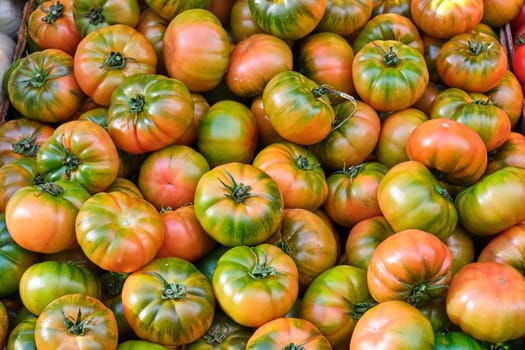 Beef tomatoes for sale at a market