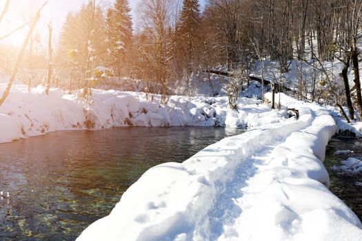 Snow path at Plitvice lakes during winter, Croatia, Europe