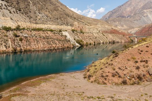 The Naryn River in the Tian Shan mountains, Karakol Kyrgyzstan, fishermen on the river