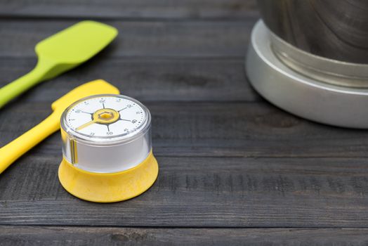 kitchen timekeeping and cooking tool on wood table