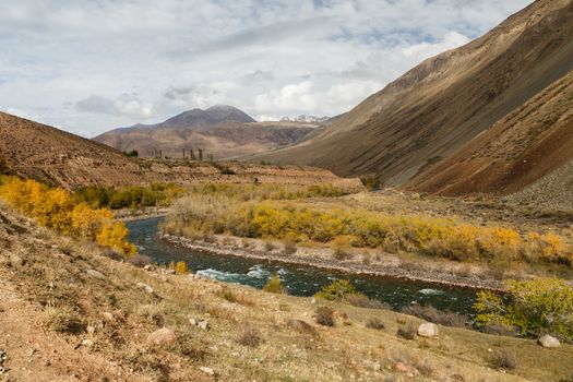 Kokemeren river, Kyzyl-Oi, Kyrgyzstan, mountain river autumn landscape