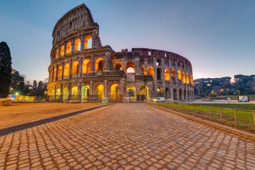 The imposing roman Colesseum in Rome before sunrise