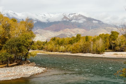 Kokemeren river, Aral, Jumgal District, Kyrgyzstan mountain river autumn landscape