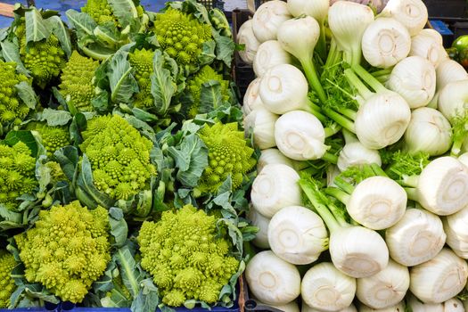 Romanesco broccoli and fennel for sale a a market