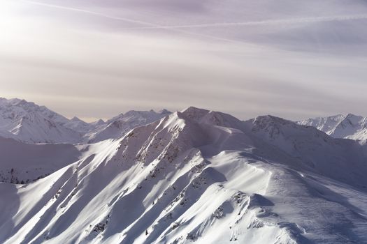 Winter snow covered mountain peaks in Europe. Great place for winter sports