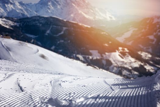 Close-up groomed snow at ski resort, slope banner background texture