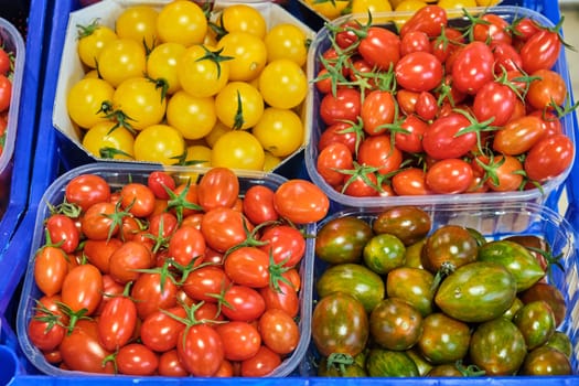 Colorful cherry tomatoes for sale at a market