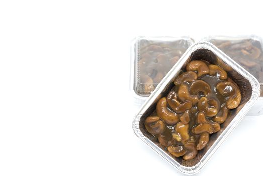 Cashews nut toffee cake in foil cup package
